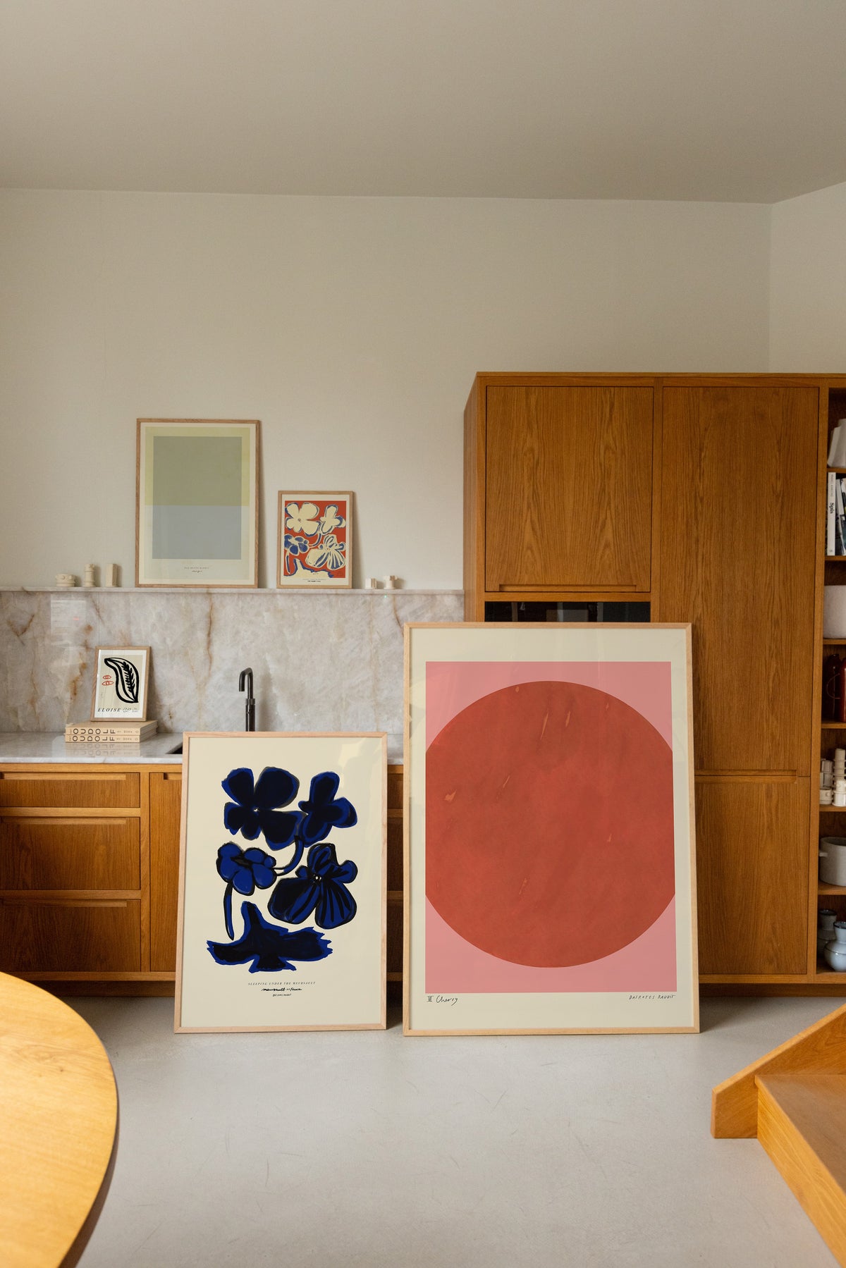 Art wall with works by Das Rotes Rabbit